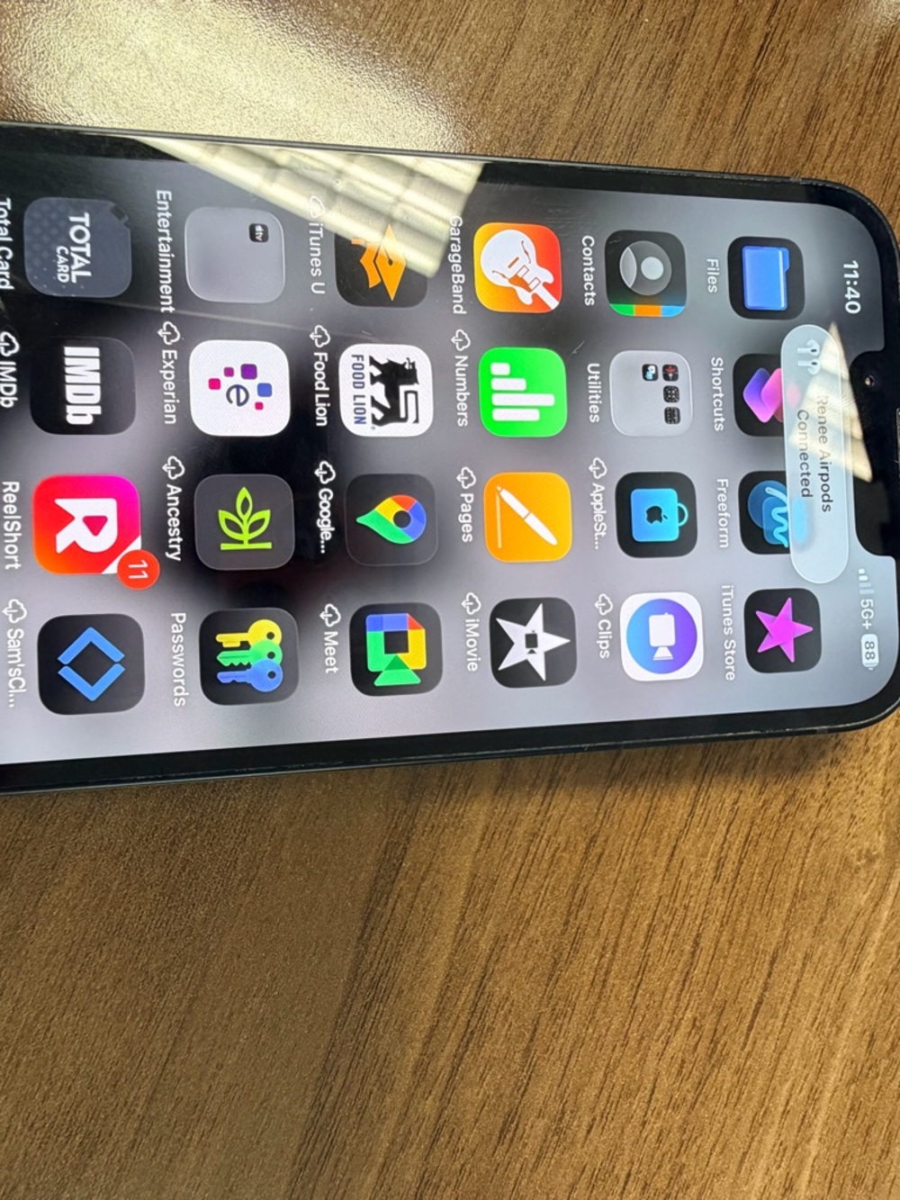 Apple iPhone with Black Frame and Colorful App Icons